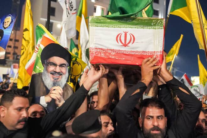 Mourners march with the body of slain Iranian Islamic Revolutionary Guard Corps commander Abbas Nilforoushan during his funeral in Najaf, Iraq, Oct. 14, 2024. Photo by Qassem Al-Kaabi/AFP via Getty Images.