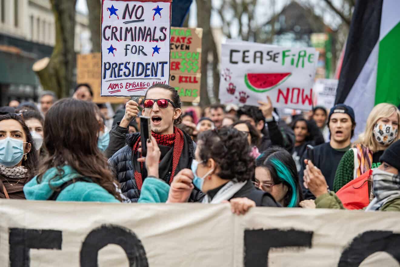Pro-Palestinian demonstrators march during a "No Votes for Genocide" rally organized by the Boston Coalition for Palestine ahead of the U.S. general election in Boston, on Nov. 2, 2024. Photo by Joseph Prezioso / AFP via Getty Images.
