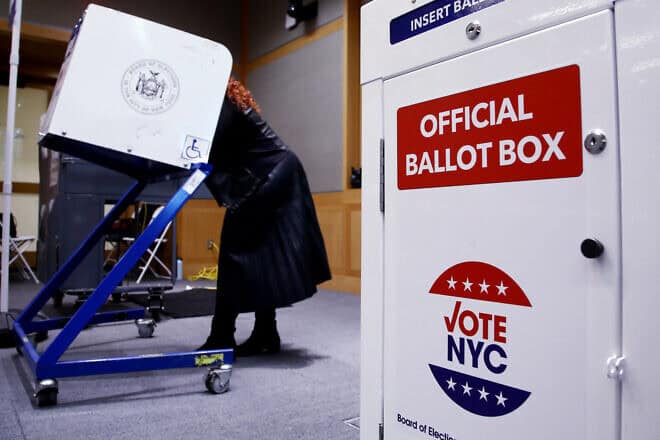Voters fill out their ballots at a polling station in New York City on Election Day, Nov. 5, 2024. Photo by Leonardo Munoz/ AFP via Getty Images.