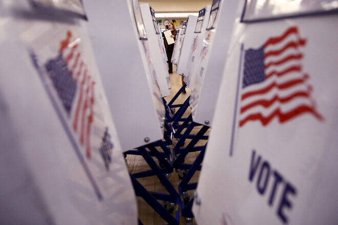 People vote at a polling station in New York City on Election Day, Nov. 5, 2024. Photo by Leonardo Munoz/AFP via Getty Images.
