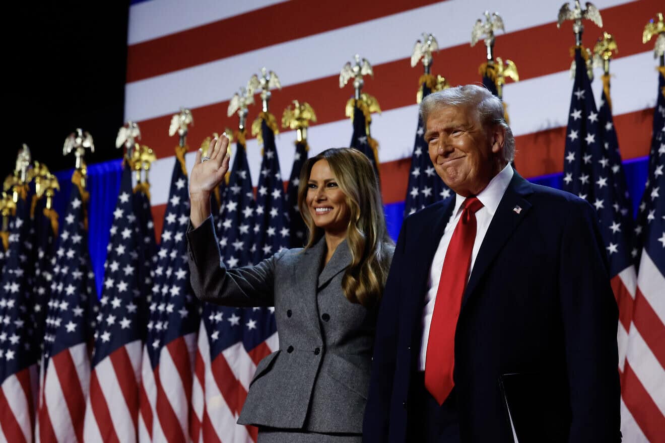 Republican presidential nominee, former U.S. President Donald Trump arrives to speak with former first lady Melania Trump during an election night event at the Palm Beach Convention Center on Nov. 6, 2024 in West Palm Beach, Florida. Photo by Chip Somodevilla/Getty Images.