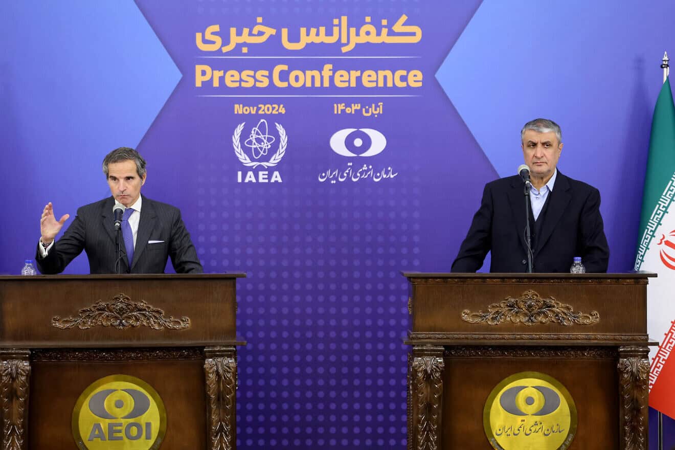 Iran's head of the Atomic Energy Organization Mohammad Eslami (right) and the United Nations nuclear chief Rafael Grossi give a joint press conference in Tehran on Nov. 14, 2024. Photo by Atta Kenare/AFP via Getty Images.