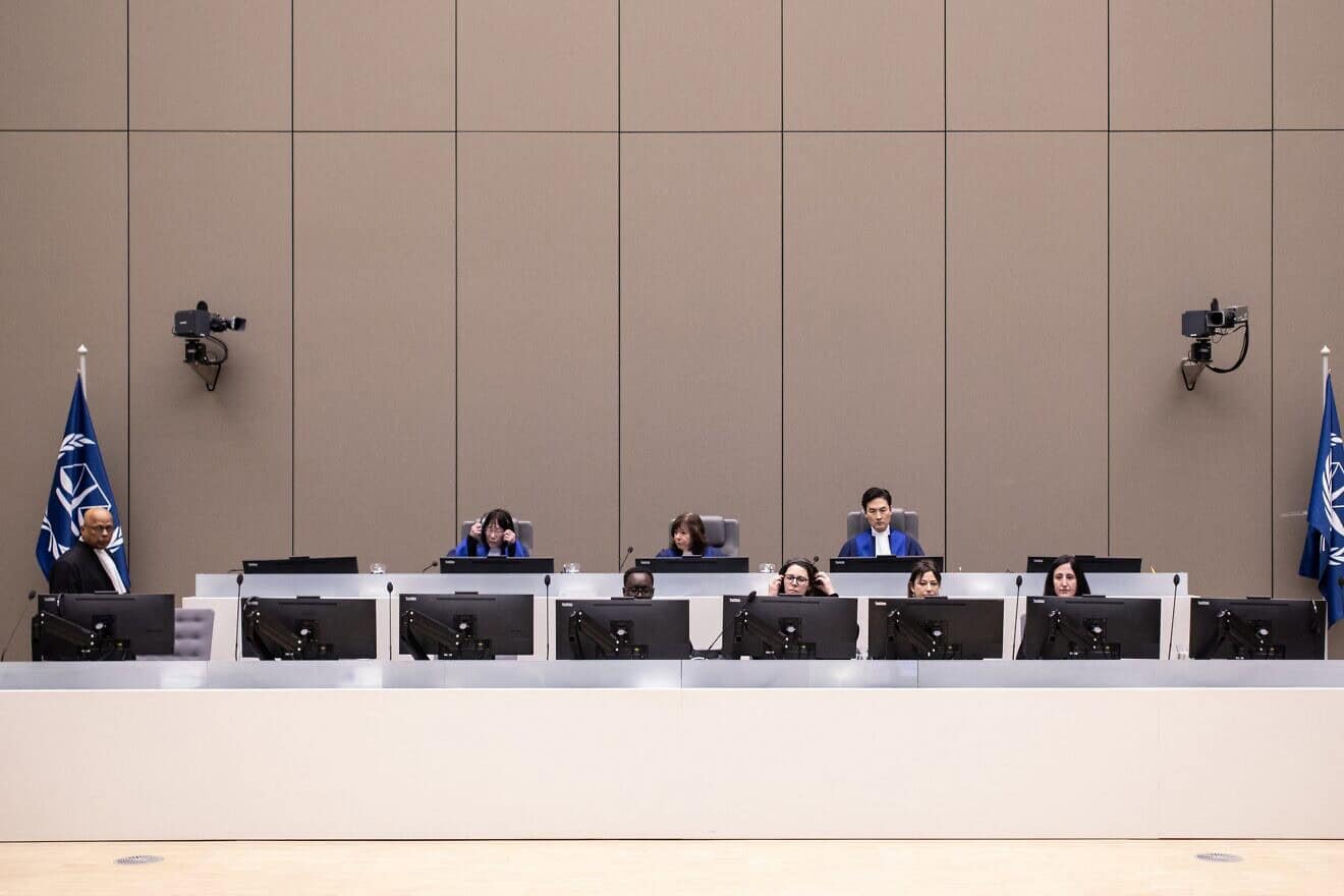 Judges (top row, from left) Tomoko Akane, Kimberly Prost and Keebong Paek sit prior to the announcement of the International Criminal Court verdict that sentenced Malian Jihadist police chief Al Hassan Ag Abdoul Aziz Ag Mohamed Ag Mahmoud to 10 years in jail for war crimes and crimes against humanity committed during a reign of terror in the fabled Malian city of Timbuktu at the ICC court in The Hague on Nov. 20, 2024. Photo by Eva Plevier/ANP/POOL/AFP via Getty Images.