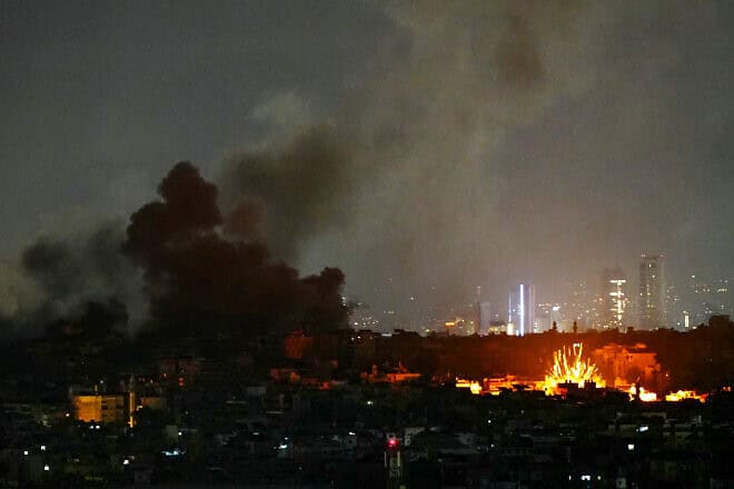 Smoke rises and a fireball erupts from the site of Israeli airstrikes that targeted Beirut's southern suburbs amid the ongoing war between Israel and Hezbollah, Nov. 24, 2024. Photo by AFP via Getty Images.