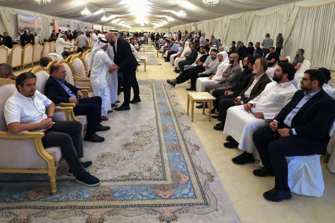Mourners attend the funeral of slain Hamas chief Ismail Haniyeh in the Qatari capital Doha on Aug. 2, 2024. Photo by Mahmud Hams/AFP via Getty Images.
