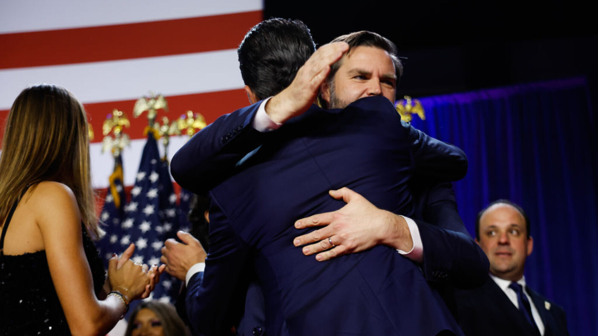 U.S. Vice President-elect J.D. Vance hugs Donald Trump Jr. during an election night event at the Palm Beach Convention Center in Florida on Nov. 6, 2024. Photo by Chip Somodevilla/Getty Images.