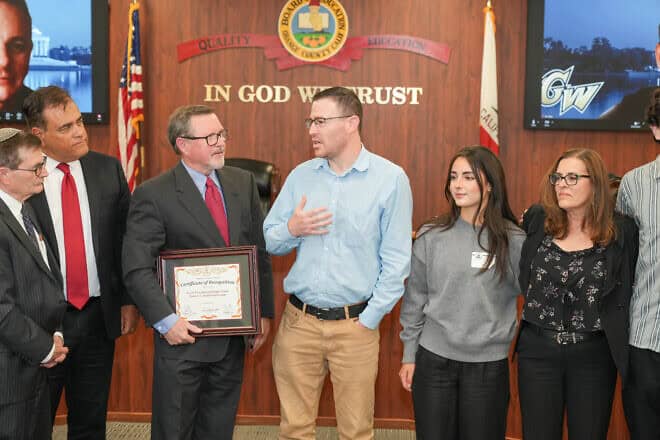Attending an Orange County Board of Education meeting are, from left, Jerry Isaac-Shapiro, senior director of the Rose Project;
Board of Education trustee Jorge Valdes; Board of Education trustee Ken L. Williams, Jr.; Chen Shterenbach, director of community relations and the Rose Project; high school student Mia Ben Zvi; and, Student-to-Student coordinator Robin Steinmetz. Photo by John Wolfsohn, Jewish Federation of Orange County.