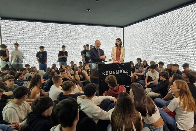 Holocaust Museum Director Michael Rothwell and British Ambassador to Portugal Lisa Bandari speaking to schoolchildren at the Holocaust Museum of Porto, Nov. 7, 2024. Credit: Holocaust Museum of Porto.