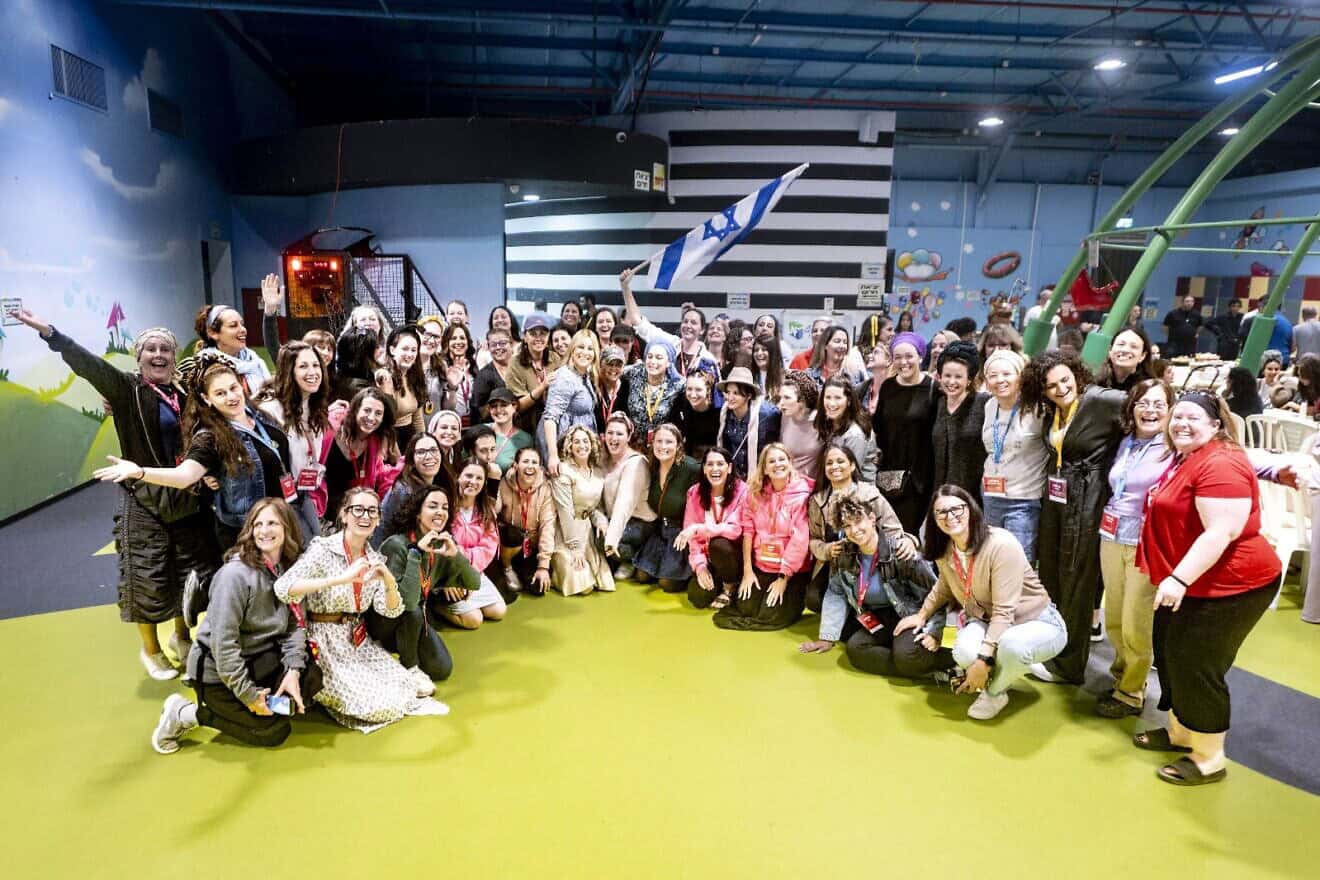 A group of 100 women from eight American cities traveled to Israel as part of an eight-day trip from Nov. 4-11, 2024, organized by the global Jewish organization Momentum. Here, they visit mothers of lone soldiers in the Israel Defense Forces in the southern Israeli city of Sderot. Photo by Aviram Valdman.