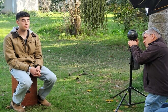 Released hostage Ofir Engel being filmed at Kibbutz Be'eri for the Survived to Tell-Be the Witness VR project, January 2024. Credit: Survived to Tell-Be the Witness.