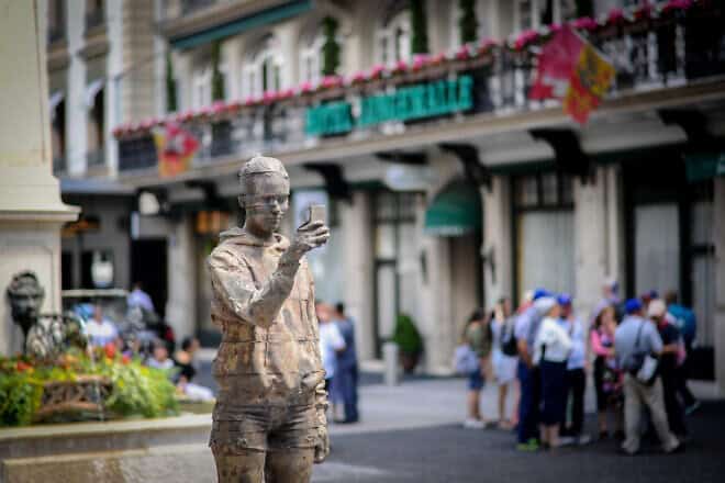 A sculpture of a person holding a smartphone in Geneva, Switzerland, July 12, 2017. Photo by Mendy Hechtman/Flash90.