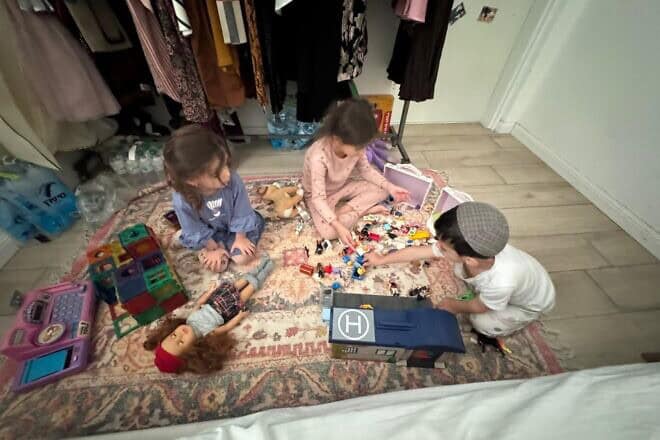 The Vaknin kids playing in the family bomb shelter in Netivot, nine miles from the Gaza Strip. Credit: Courtesy.