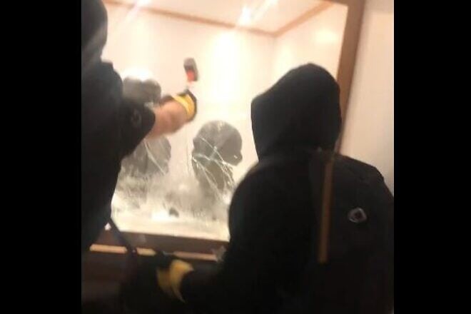 Masked anti-Israel protesters steal two busts of Chaim Weizmann at Manchester University, Nov. 2, 2024. Credit: X/Palestine Action.