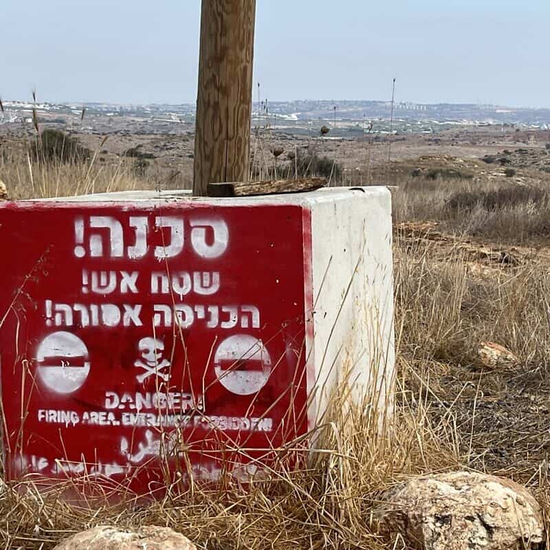 A warning sign marking the entry to IDF Firing Zone 203 in central Israel, near Rosh HaAyin, Sept. 5, 2024. Credit: Josh Hasten.