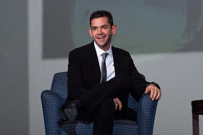 Jared Isaacman speaks at the 30th Annual National Character and Leadership Symposium in Arnold Hall at the U.S. Air Force Academy in Colorado Springs, Colo., on Feb. 23, 2023. Credit: Trevor Cokley/U.S. Air Force via Wikimedia Commons.