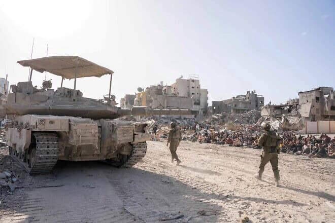 Israeli forces and captured Hamas and Palestinian Islamic Jihad terrorists during the raid on the Kamal Adwan Hospital in the Gaza Strip, on Dec. 28, 2024. Credit: IDF.