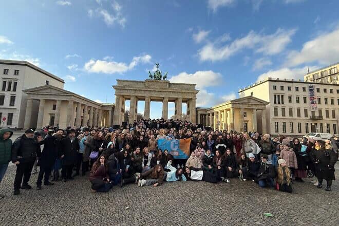 Some of the 500 Jewish teens from 25 countries across Europe gathered for a group photo in front of the Brandenburg Gate in Berlin, while attending the European Jewish Youth Congress from Dec. 13-15, 2024. Credit: Courtesy of Chabad CTeen Berlin.