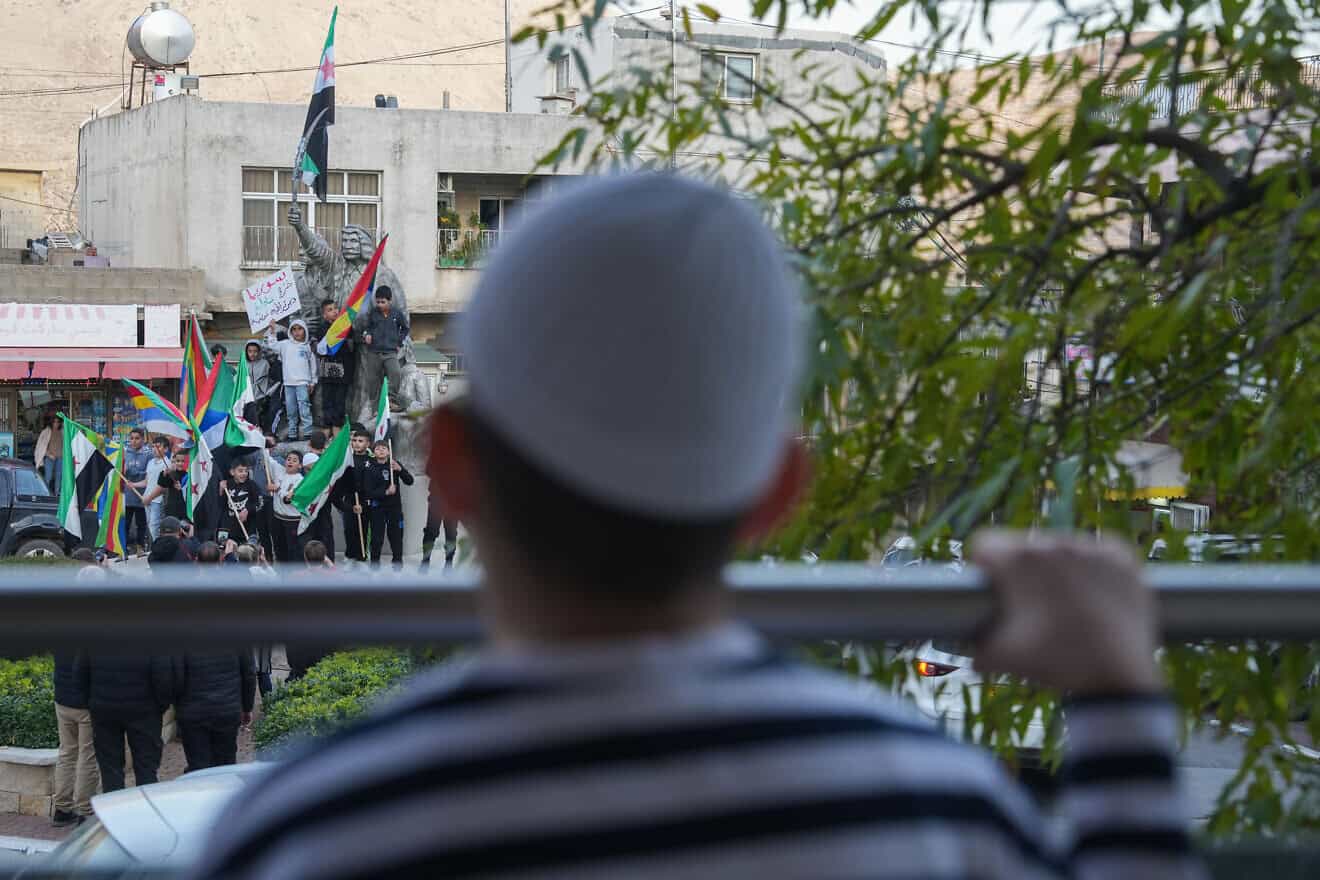 Residents in the Druze village of Majdal Shams in the Golan Heights celebrate after rebels took over Syria from the Bashar Assad regime, Dec. 9, 2024. Photo by Ayal Margolin/Flash90.