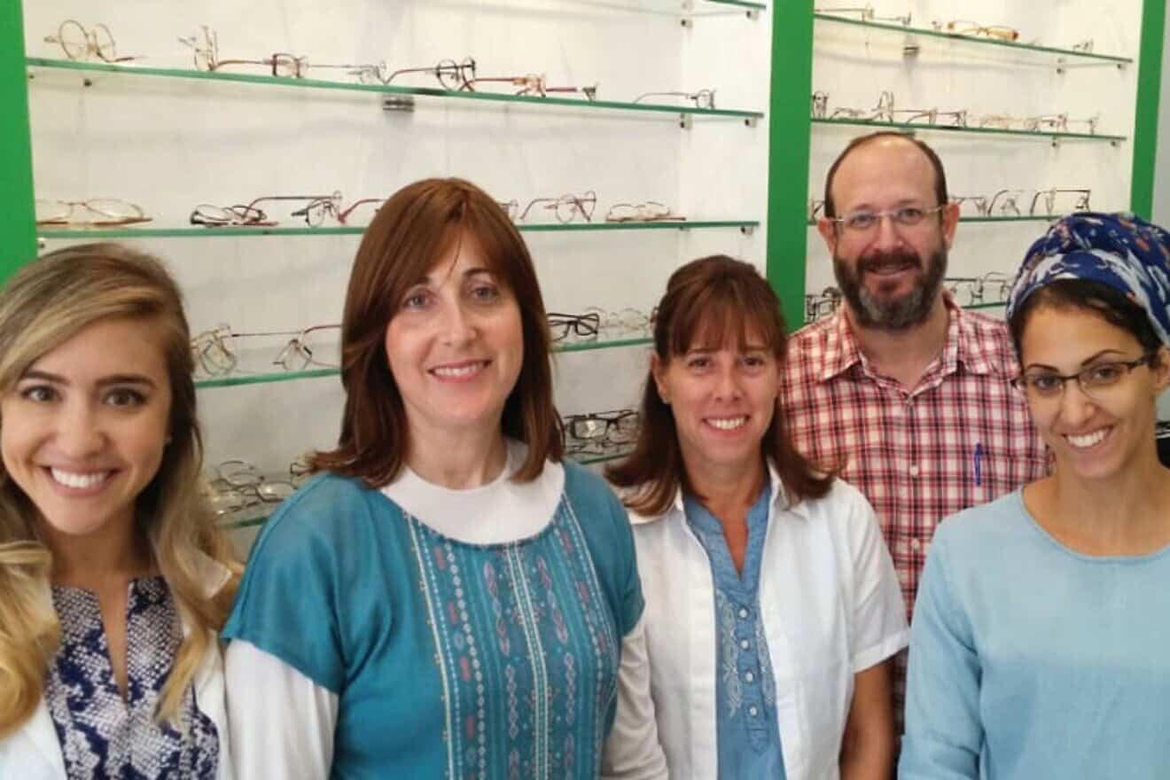 Chana Simon (second left) with RE-SPECS staff. Credit: Courtesy.