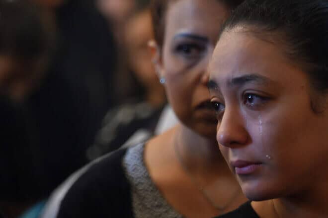 A Coptic Christian woman mourns victims killed in an attack a day earlier, during an early morning ceremony at the Prince Tadros church in Egypt's southern Minya province on Nov. 3, 2018. Photo by Mohamed El-Shahed/AFP via Getty Images.