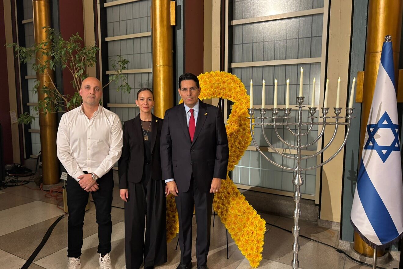 Danny Danon, the Israel ambassador to the United Nations, with Adi and Yael Alexander, parents of the hostage Edan Alexander, during a Chanukah event at the United Nations in New York, Dec. 19, 2024. Credit: Courtesy.