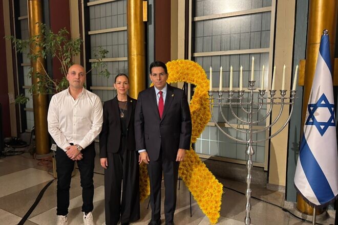 Danny Danon, the Israel ambassador to the United Nations, with Adi and Yael Alexander, parents of the hostage Edan Alexander, during a Chanukah event at the United Nations in New York, Dec. 19, 2024. Credit: Courtesy.