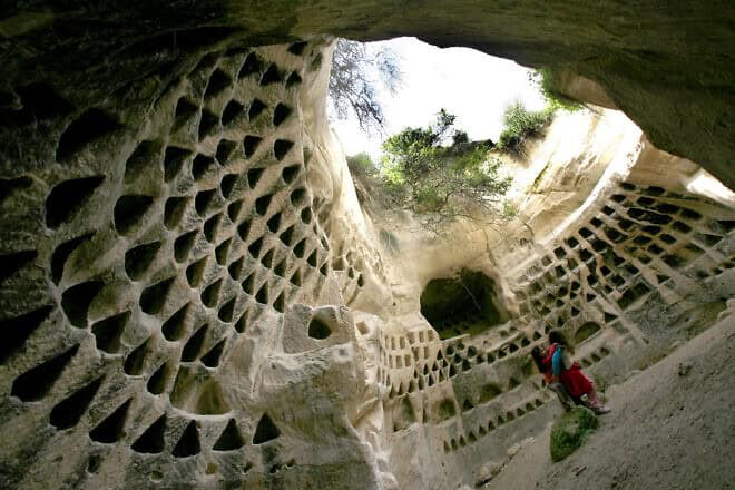 Israeli children visit a columbarium, part of the cave where doves were raised for food in the Madras Caves, on March 4, 2007. Participants in what is known as the Bar Kochba rebellion, the Jewish rebellion against Rome in 132-135 C.E., hid in similar caves. The caves were found full of belongings–pottery, shoes, coins, etc.– of Bar Kochba’s people. Photo by Nati Shohat/Flash90.