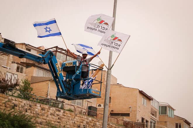 Israeli flags in honor of Independence Day in the Judea city of Efrat, April 5, 2020. Photo by Gershon Elinson/Flash90.