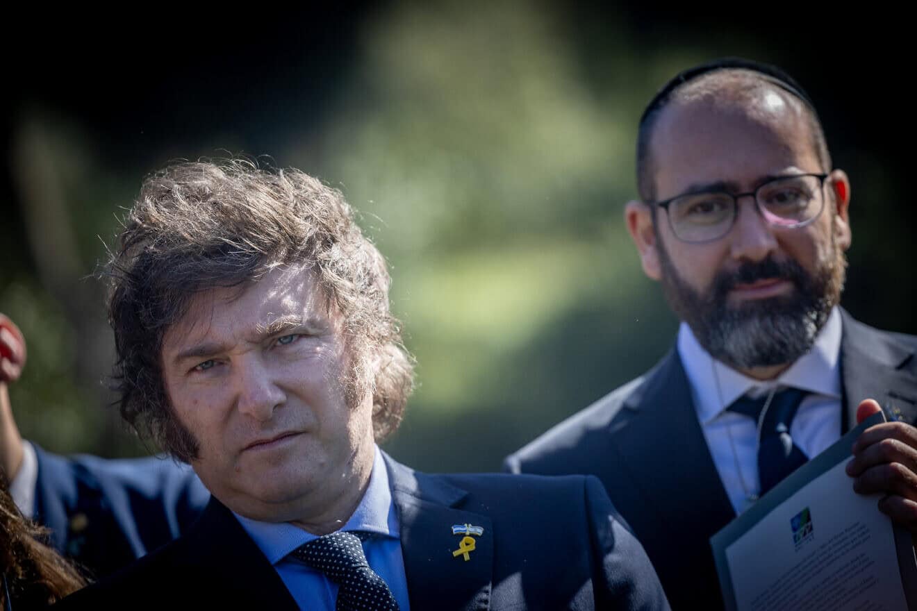 Argentina's President Javier Milei (left) and Ambassador to Israel Shimon Axel Wahnish attend a tree-planting ceremony in Milei's honor at the Grove of Nations in the Jerusalem Forest on Feb. 7, 2024. Photo by Yonatan Sindel/Flash90.