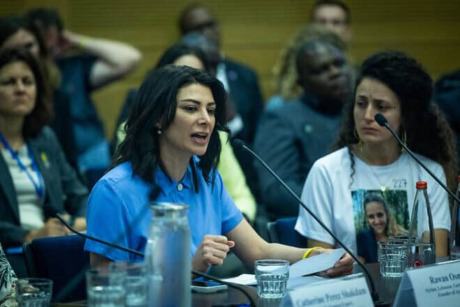 Syrian-Lebanese peace activist Rawan Osman addresses a meeting of the “Global Women’s Coalition Against Gender-Based Violence as a Weapon of War" at the Knesset in Jerusalem, May 20, 2024. Photo by Yonatan Sindel/Flash90.