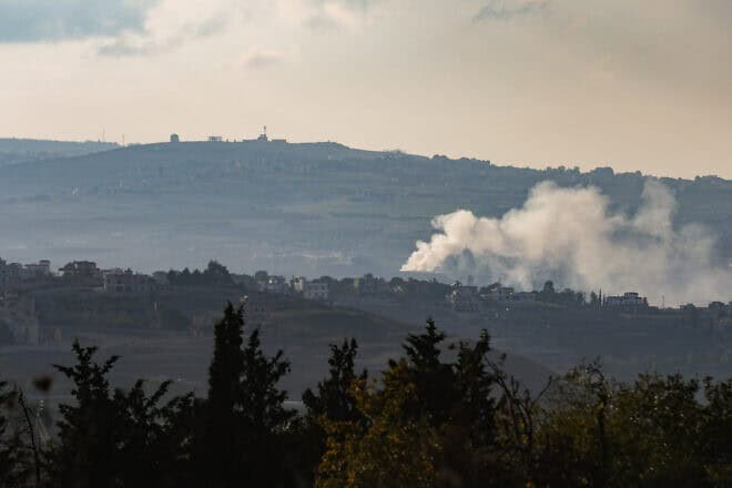 Smoke rises from a village in Southern Lebanon, as seen from the Israeli side of the border, Dec. 5, 2024. Photo by David Cohen/Flash90.