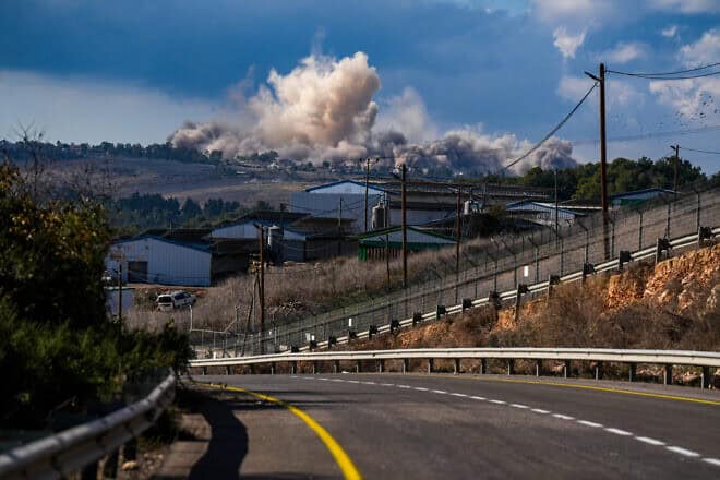 Smoke after a blast in the village of Yaroun in Southern Lebanon, as seen from Moshav Avivim in Israel, Dec. 17, 2024. Photo by Ayal Margolin/Flash90.