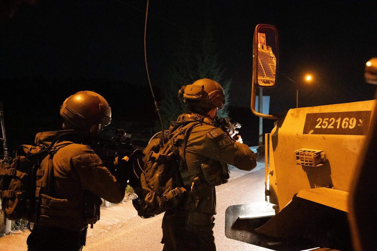 Israeli troops search for a Palestinian terrorist who injured four people in a car-ramming attack near Hebron in Judea, Dec. 7, 2024. Credit: IDF.
