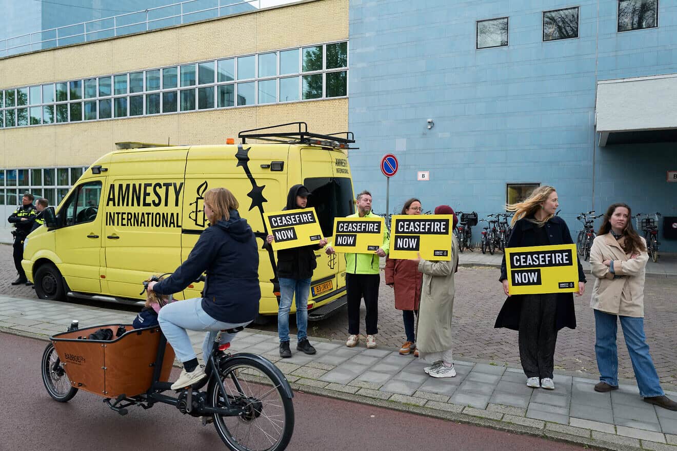 Amnesty International activists protest outside the Israeli embassy in The Hague, the Netherlands, May 8, 2024. Photo by Pierre Crom/Getty Images.