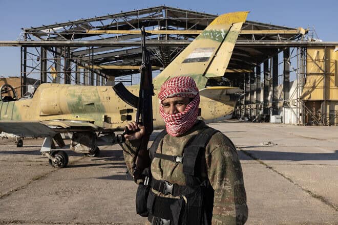A Syrian National Army soldier in Aleppo, Syria, Dec. 3, 2024. Photo by Ugur Yildirim/dia images via Getty Images.