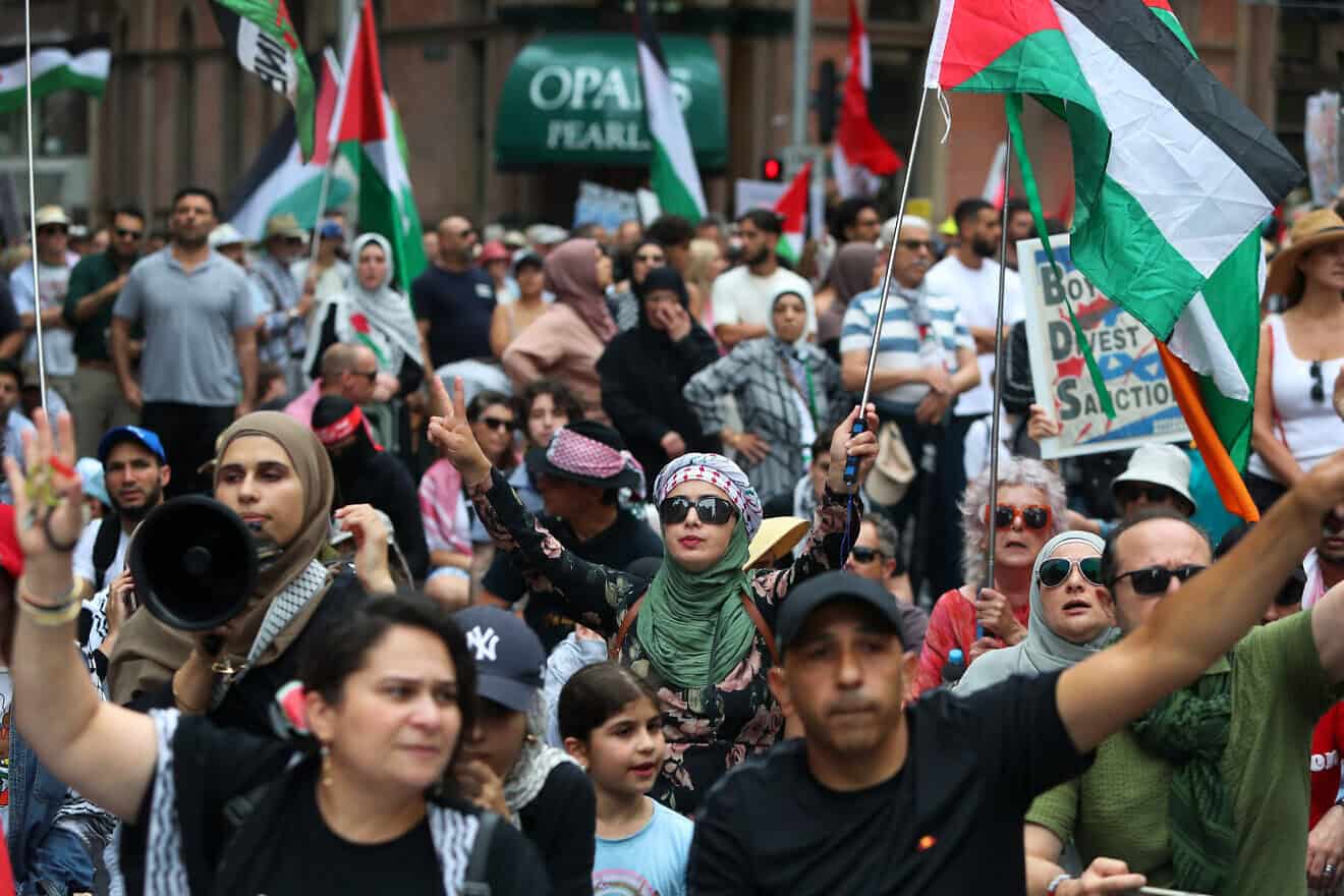 Pro-Palestinian protesters rally in the central business district on Dec. 8, 2024 in Sydney, Australia. Photo by Lisa Maree Williams/Getty Images.
