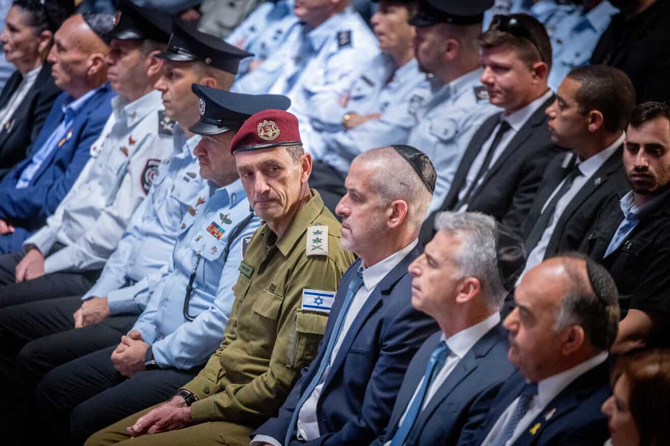 Israel Defense Forces Chief of Staff Herzi Halevy, Ronen Bar, head of the Shin Bet security and Mossad chief David Barnea attend a ceremony of laying of the Israeli flags on each fallen soldier's grave at Mount Herzl military cemetery in Jerusalem, on May 8, 2024. Photo by Chaim Goldberg/Flash 90.