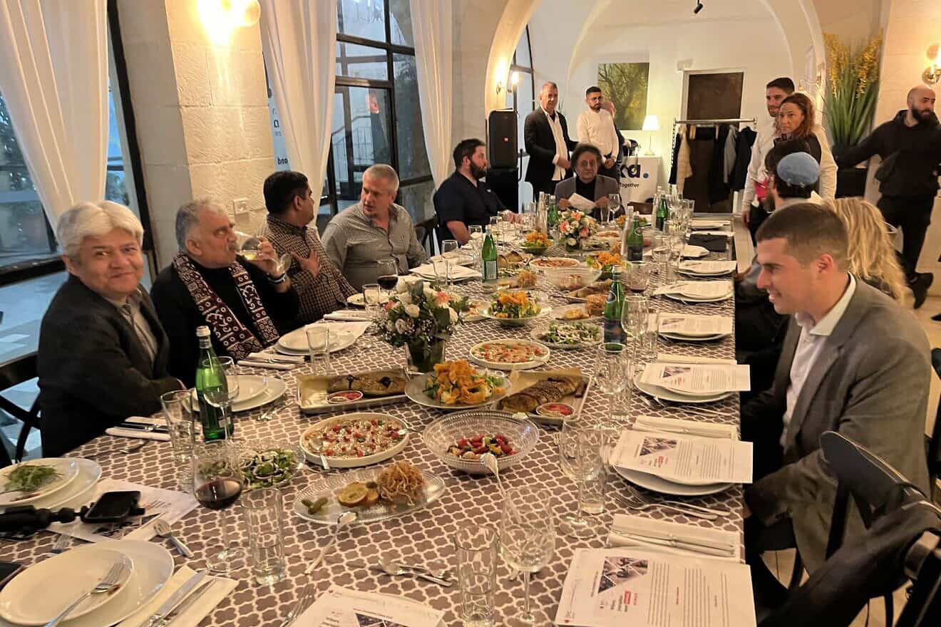 South Asian Muslim leaders, journalists, influencers, professionals, academics and civil society activists visiting Israel as part of a coexistence initiative share a dinner in Jerusalem, Dec. 3, 2024. Photo: Josh Hasten.