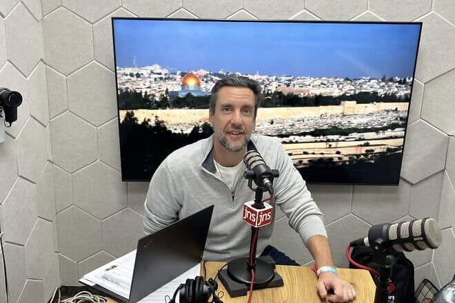 U.S. talk radio host Clay Travis broadcasts live from the JNS studios in Jerusalem.