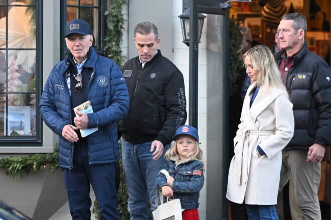 U.S. President Joe Biden walks out of Nantucket Bookworks with his son Hunter Biden, grandson Beau and daughter-in-law Melissa Cohen Biden in Nantucket, Mass., on Nov. 29, 2024. He is carrying the book “The Hundred Years’ War on Palestine” by Rashid Khalidi. Photo by Mandel Ngan/AFP via Getty Images.