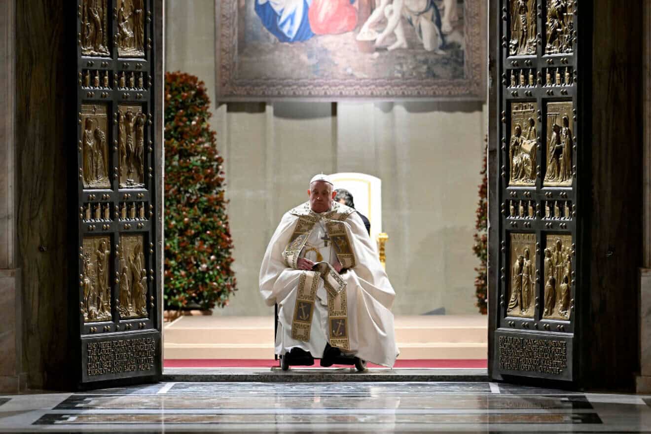 Pope Francis inaugurates the Catholic Church's 2025 Jubilee Year with the opening of the Holy Door at St. Peter's Basilica in Vatican City on Dec. 24, 2024. Photo by Vatican Media via Vatican Pool/Getty Images.