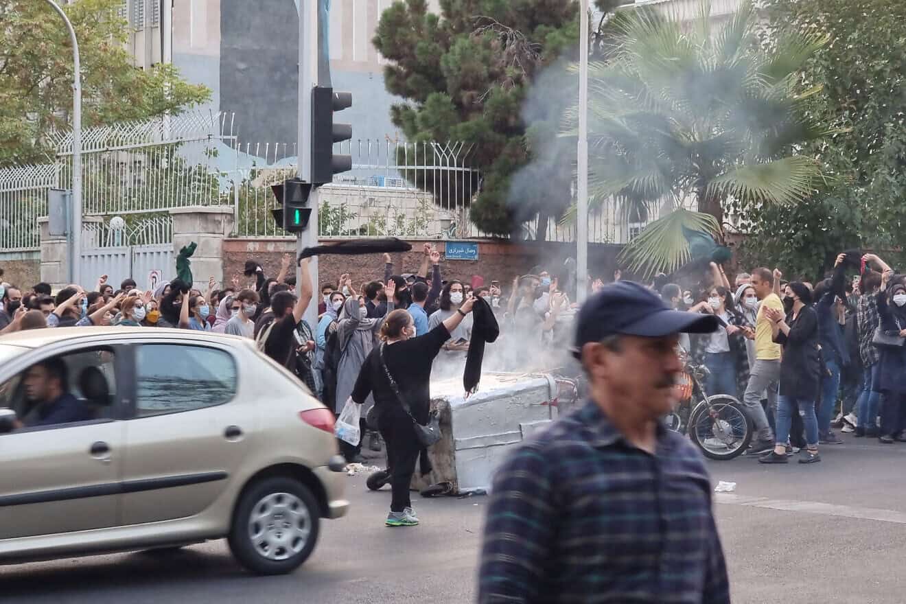People protest in Tehran against the death of Mahsa Amini, who died in police custody, on Sept. 19, 2022. Photo by Getty Images.