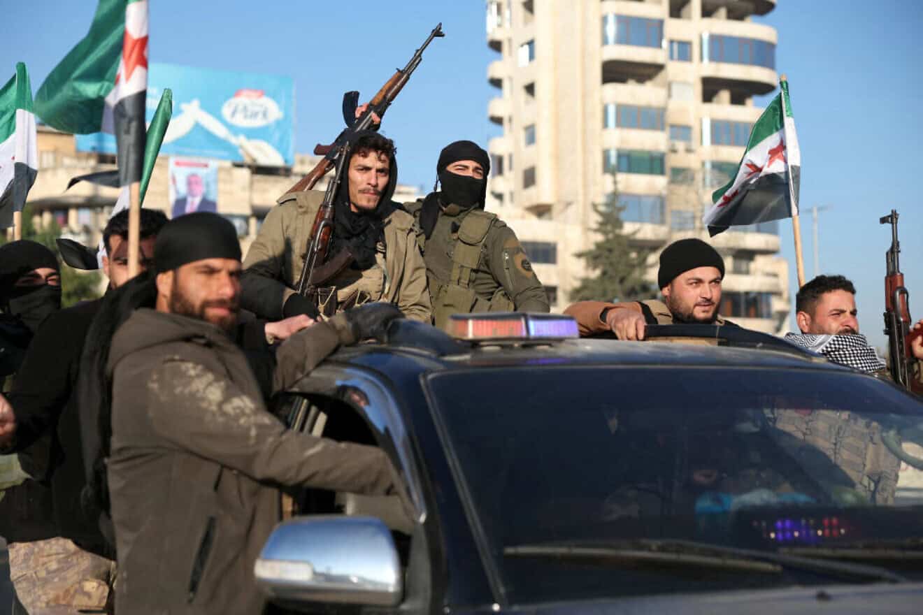 Sunni rebels in Aleppo, northwestern Syria, Nov. 30, 2024. Photo by Omar Haj Kadour/AFP via Getty Images.