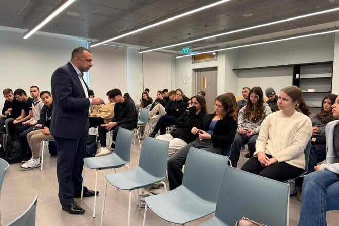 Majed el-Shafie, president and founder of the Toronto-based One Free World International organization, speaks with Israeli pupils at the Begin High School in Ramat Gan, on Jan. 15, 2025. Credit: Courtesy.