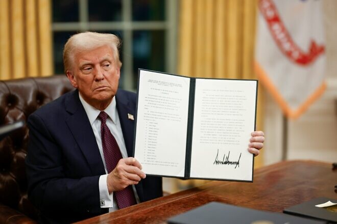 U.S. President Donald Trump signs executive orders on the first day of his second term, Jan. 20, 2025. Credit: White House.