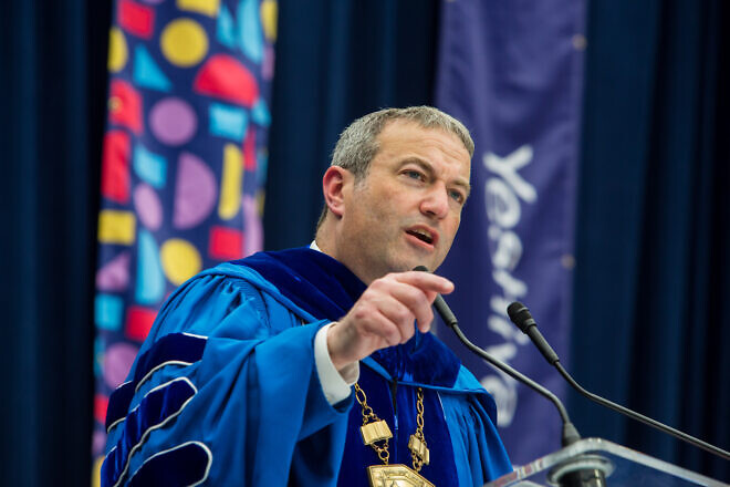 Rabbi Ari Berman, president of Yeshiva University, speaks at the school's commencement at Arthur Ashe Stadium in Flushing, Queens, on May 26, 2021. Credit: Yeshiva University.