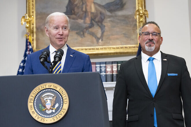 U.S. President Joe Biden and Education Secretary Miguel Cardona address student loan forgiveness, Aug. 24, 2022, in the Roosevelt Room at the White House. Credit: Erin Scott/White House.