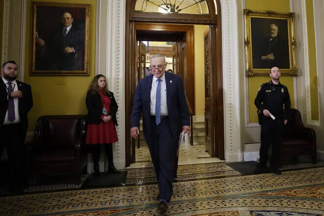 Senate Minority Leader Charles Schumer (D-N.Y.) leaves a weekly Senate Democratic luncheon at the U.S. Capitol in Washington, D.C., after Senate Democrats blocked a Republican-led sanctions bill against the International Criminal Court in The Hague, Jan. 28, 2025. Photo by Kevin Dietsch/Getty Images.