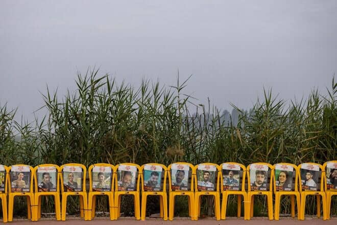 Pictures of Israelis held hostage in the Gaza Strip are displayed on chairs in southern Israel, Jan. 16, 2025. Photo by Chaim Goldberg/Flash90.