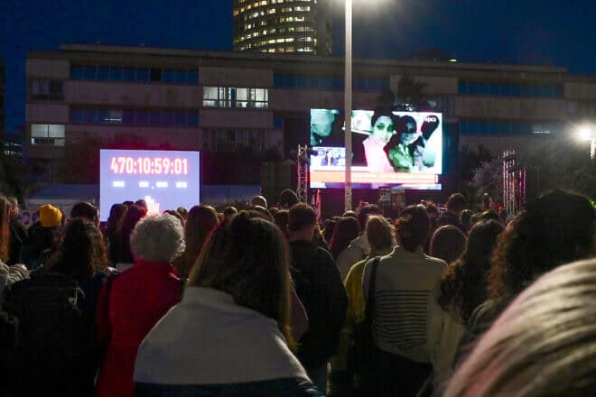 Israelis watch live on a large screen on “Hostages Square” in Tel Aviv, the release of three Israeli hostages from Hamas captivity on Jan. 19, 2025. Photo by Avshalom Sassoni/Flash90.